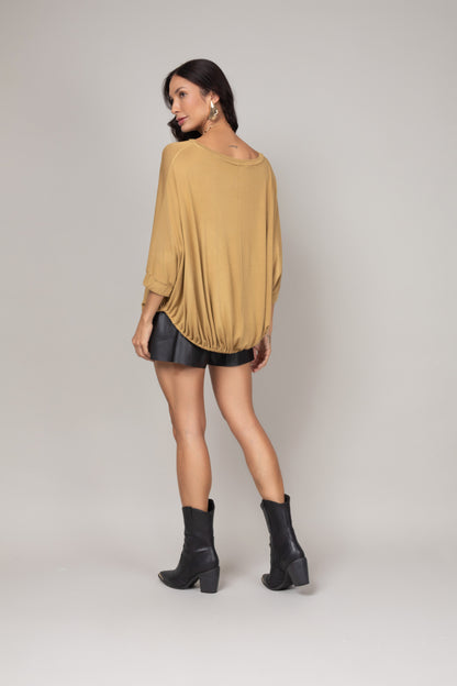 Blusa ampla com ajuste na barra