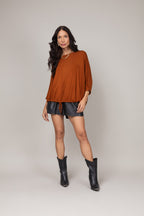 Blusa ampla com ajuste na barra