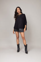 Blusa ampla com ajuste na barra