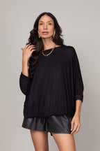 Blusa ampla com ajuste na barra