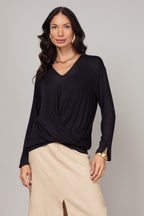 Blusa manga longa com nó frontal