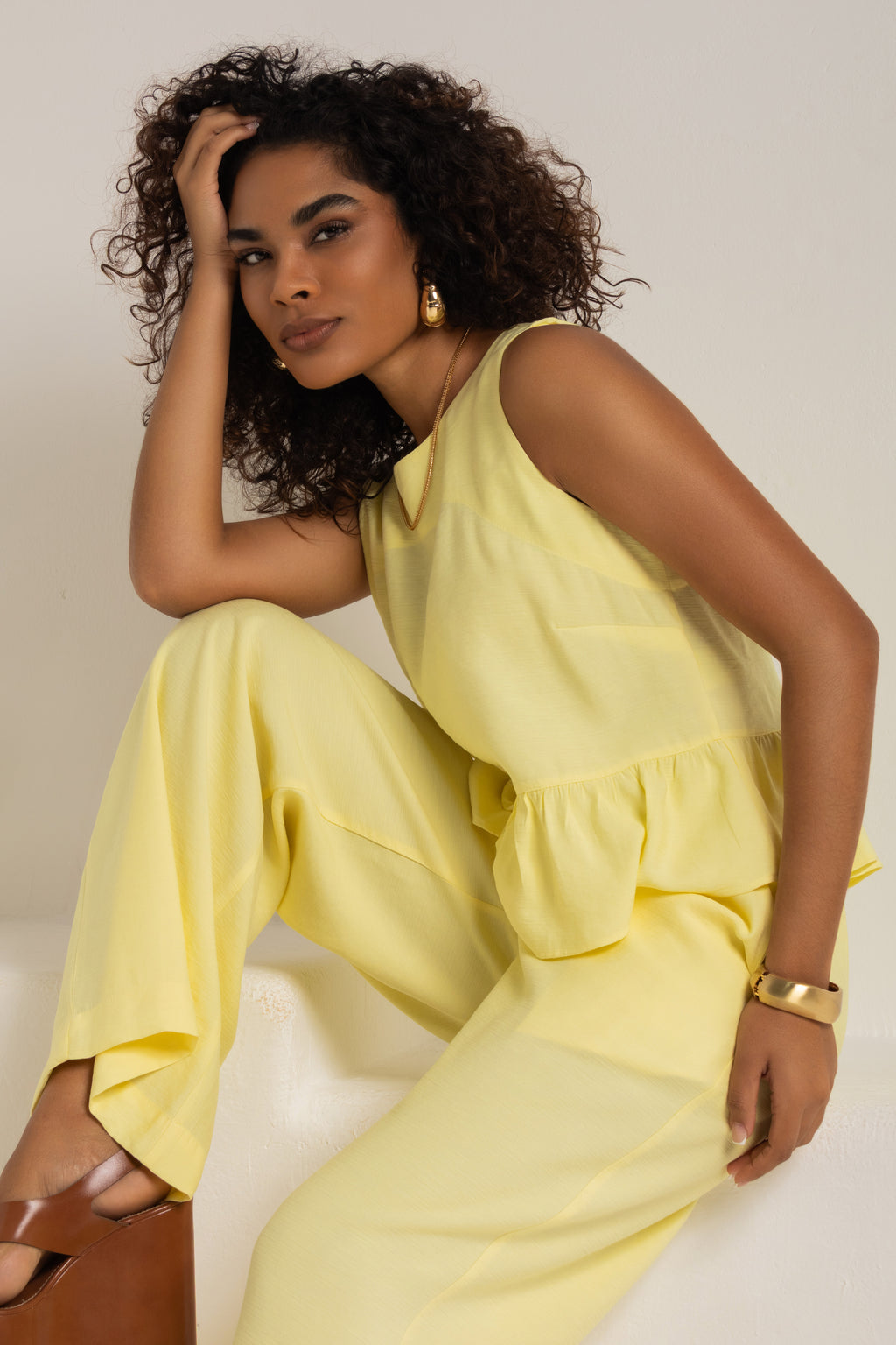 Conjunto com blusa peplum e calça pantalona