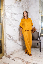 Calça pantalona em viscose maquinetada