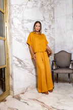 Calça pantalona em viscose maquinetada