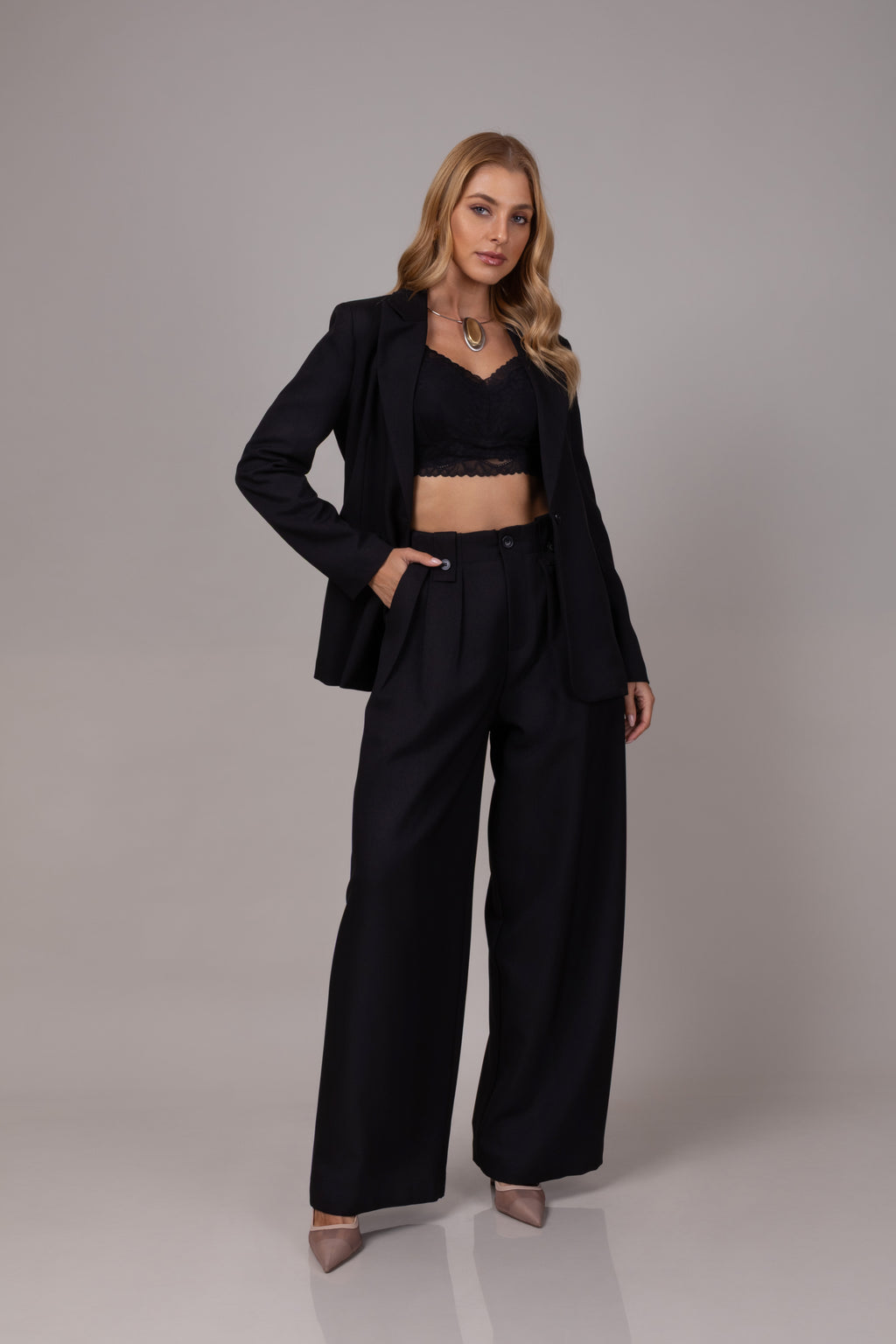 Calça alfaiataria com pregas