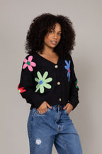 Cardigan de tricot floral