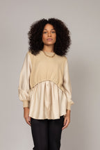 Blusa texturizada com mangas amplas