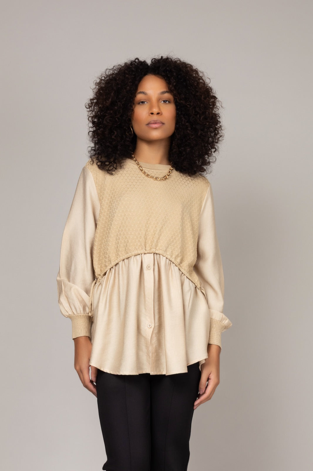 Blusa texturizada com mangas amplas