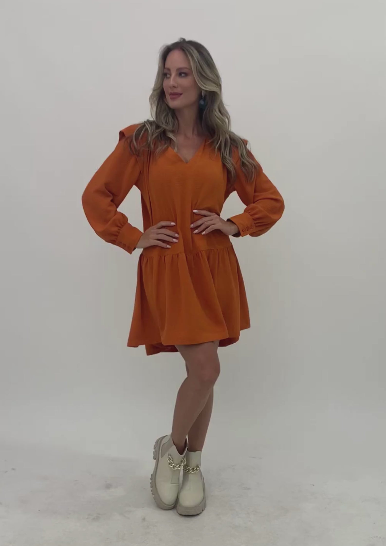 Vestido curto manga longa
